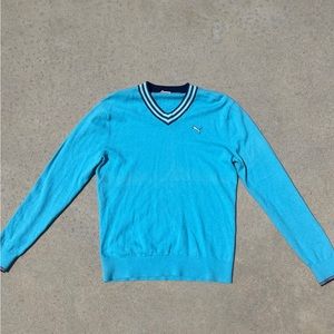 Puma bright blue v-neck sweater, striped neckline. Sporty or academic wear